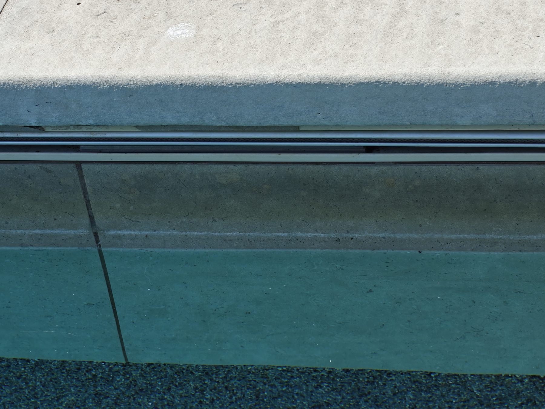 Pool edge and cover channel detail