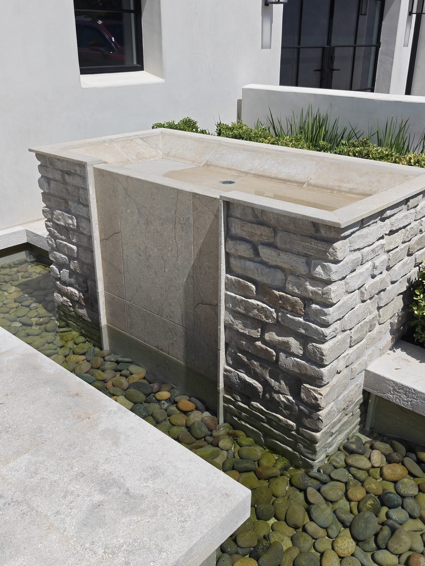 Front tiered fountain structure and lower basin