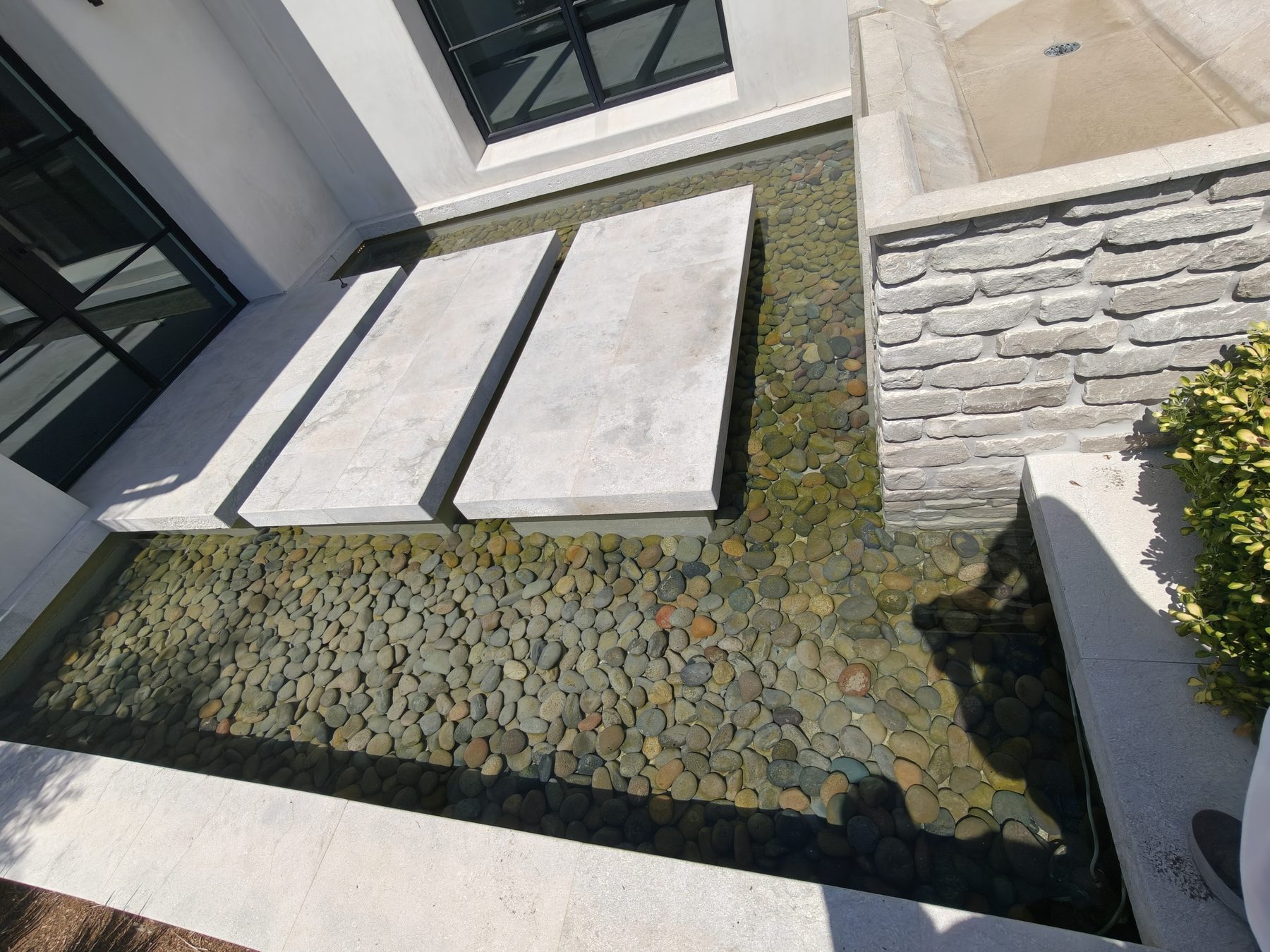 Front tiered fountain and surrounding water-feature system