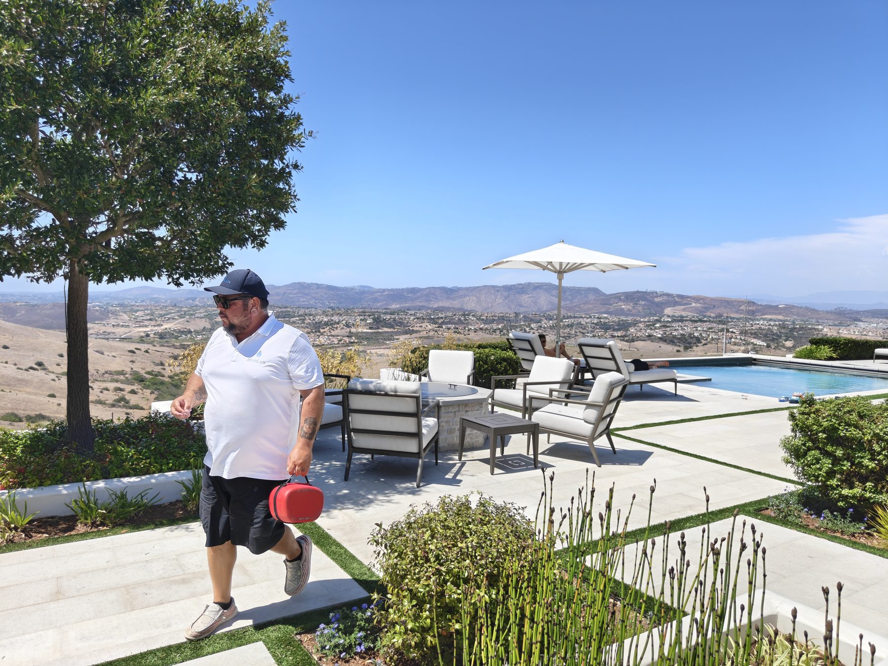 BlueLux technician at the pool terrace